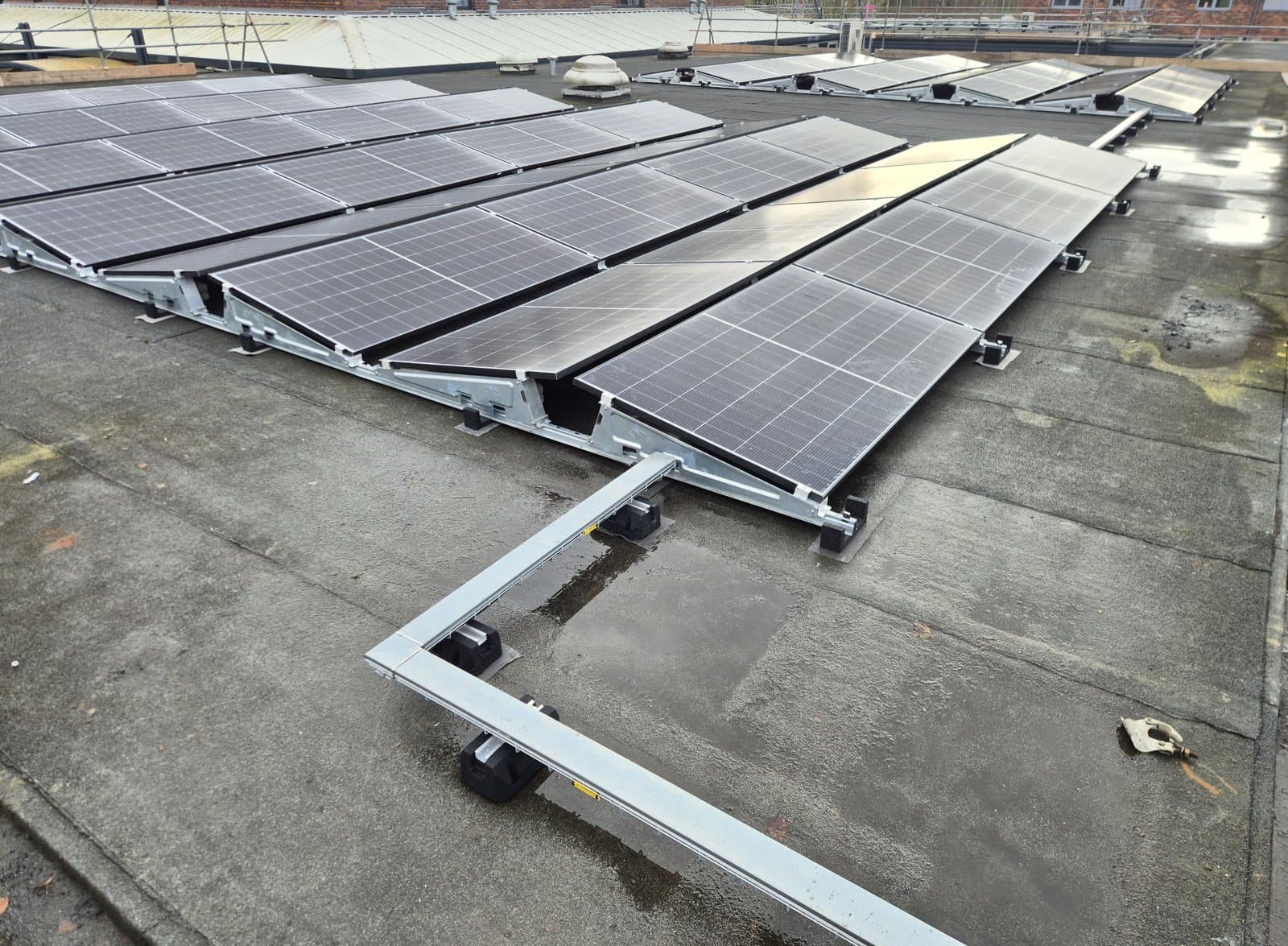 East-west ballasted system on a flat roof.