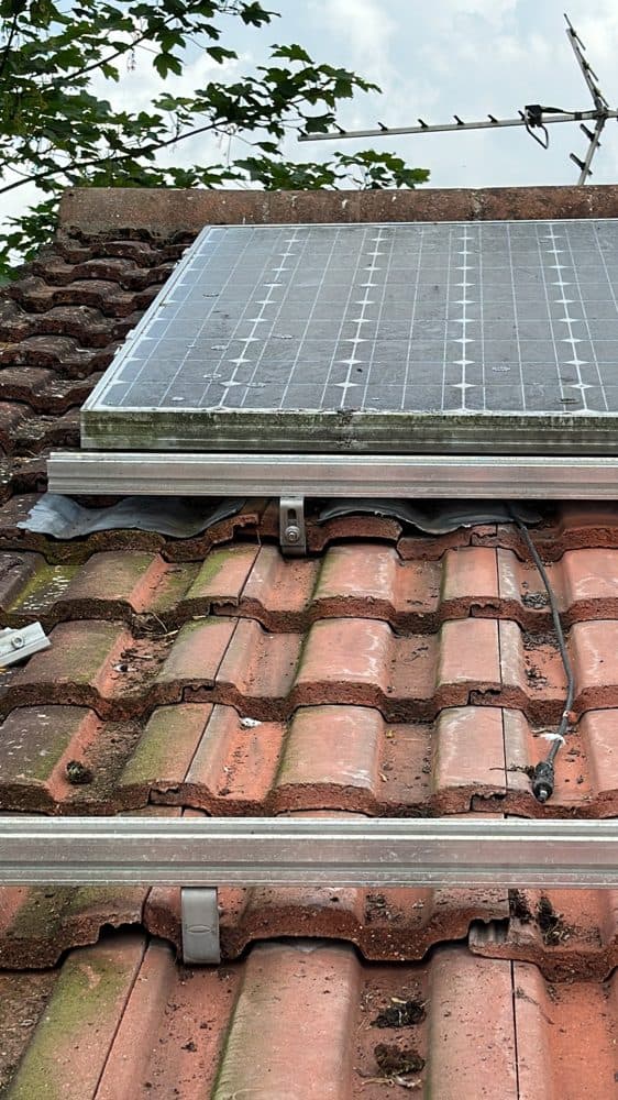 Loose cabling, lifted tiles and leftover fixings.